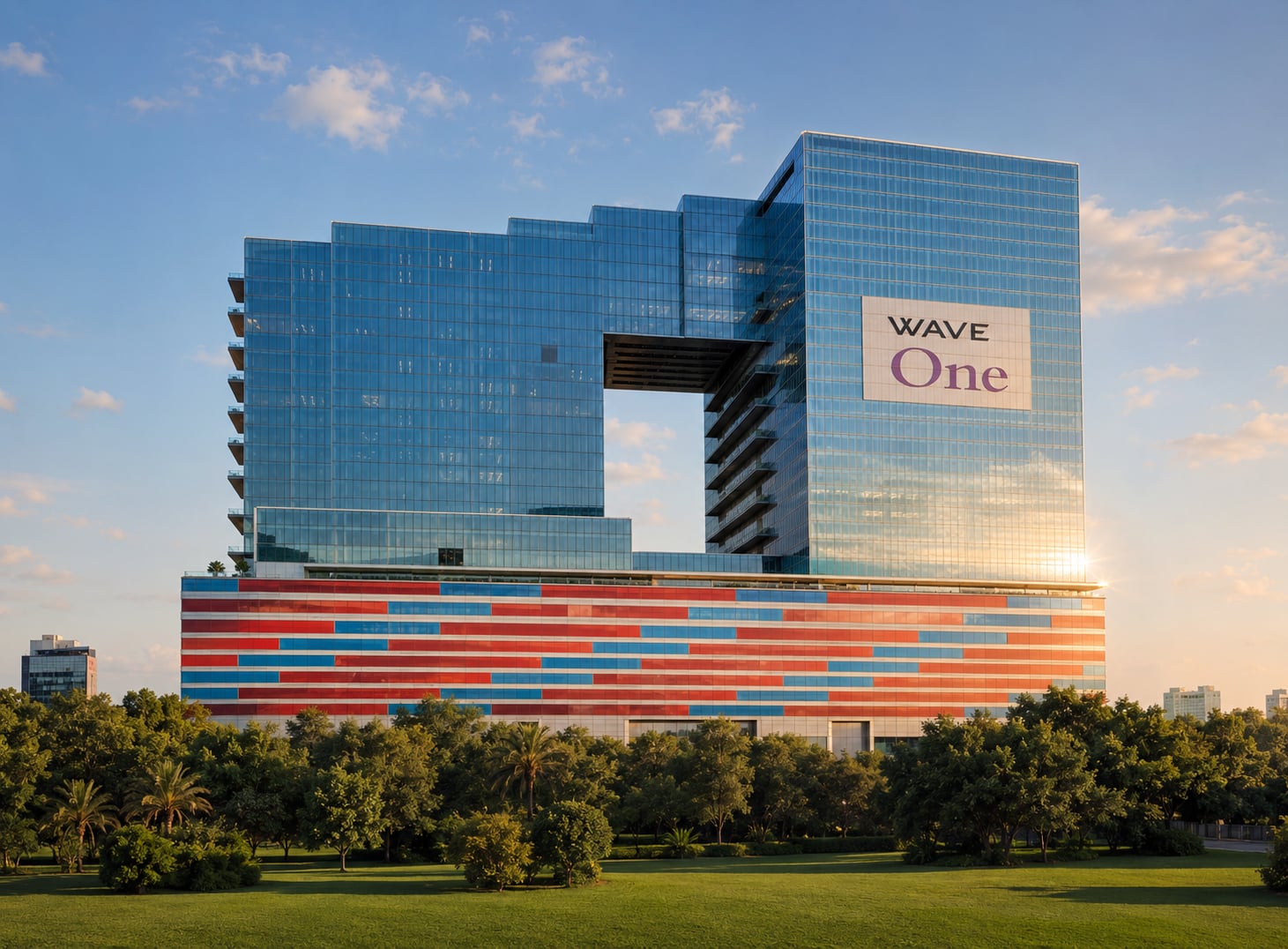 Wave One, Noida – a landmark 40-storey commercial tower featuring premium office spaces, retail facilities, and contemporary high-rise architecture.